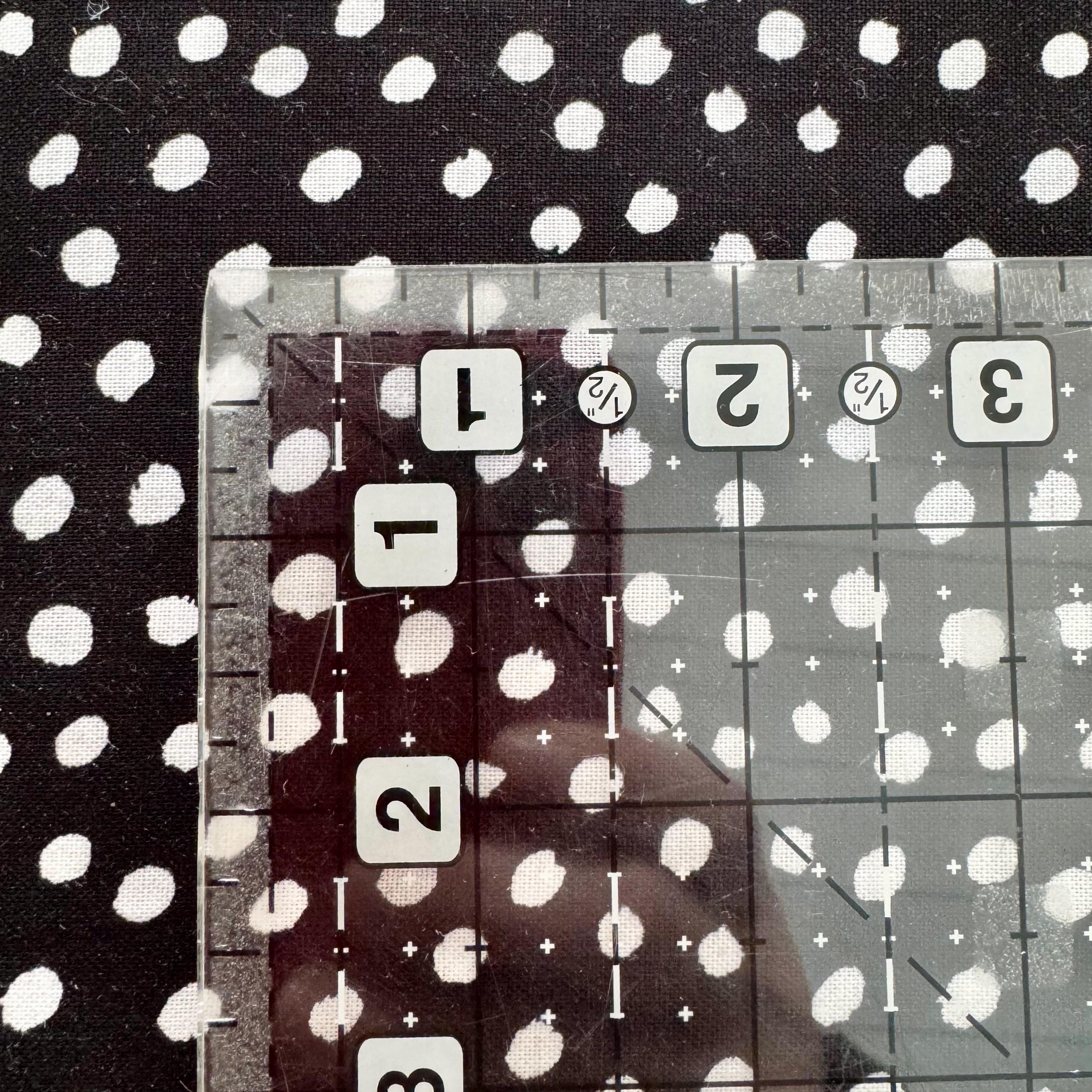 Advice From a Sunflower Black Irregular Dots Dots - 1/2 Yard Increments, Cut Continuously - by Timeless Treasures