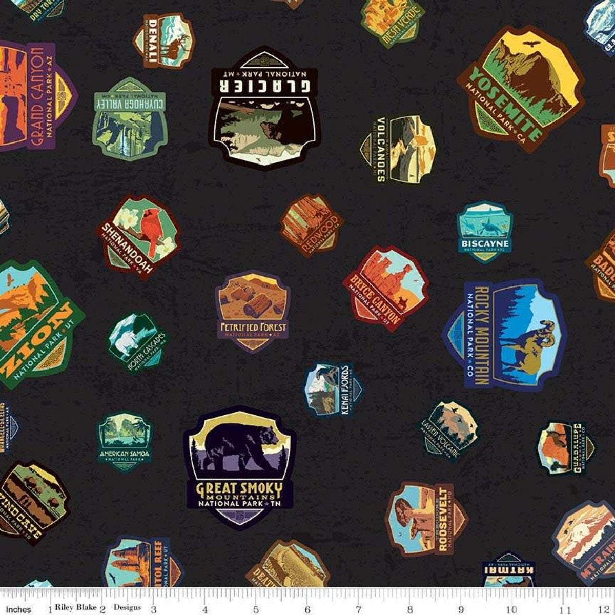National Parks Patches in Black - 1/2 Yard Increments, Cut Continuously - by Anderson Design Group for Riley Blake Designs