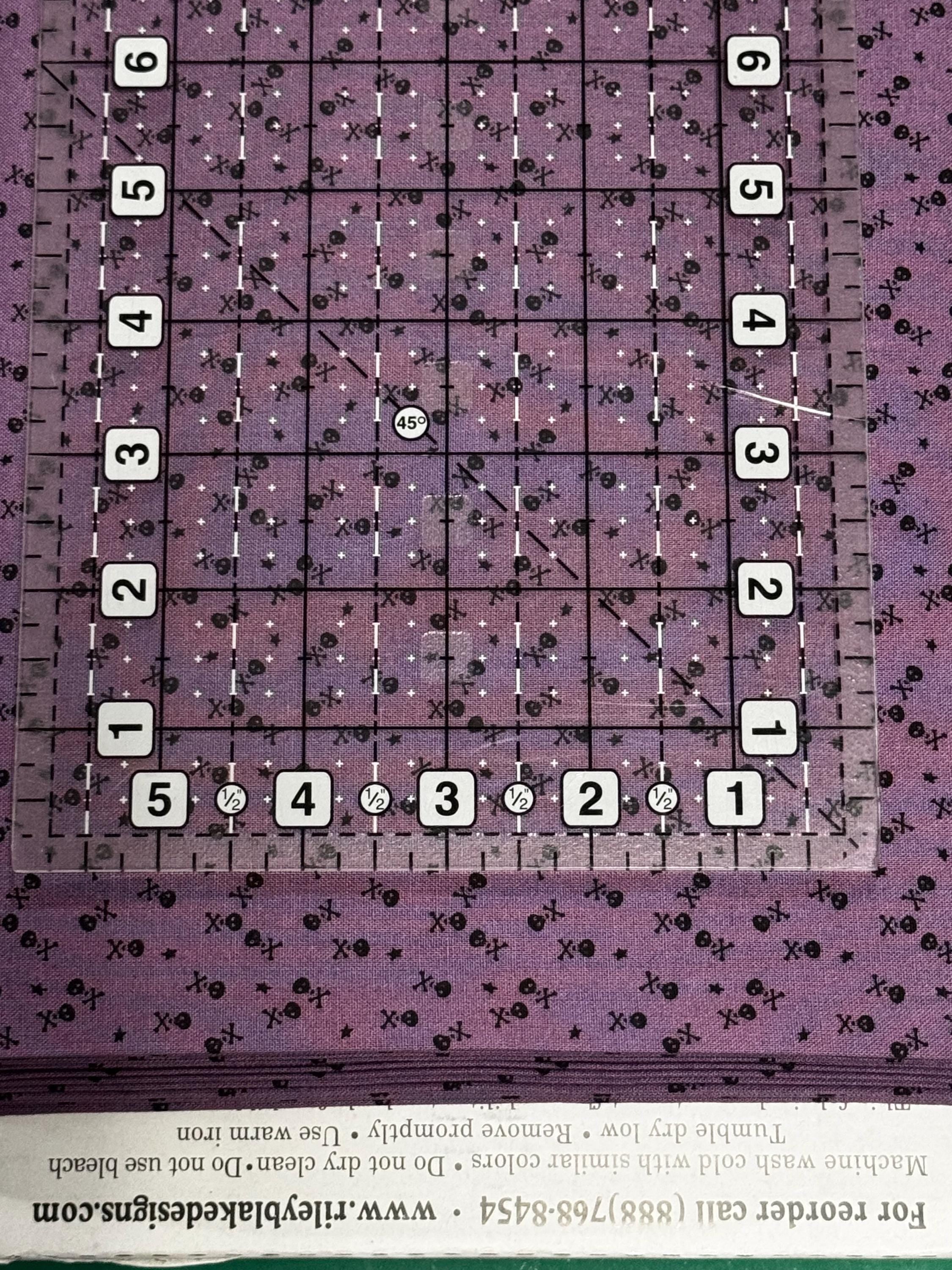 Beggar's Night Skulls in Purple - 1/2 Yard Increments, Cut Continuously - by Sandy Gervais for Riley Blake Designs