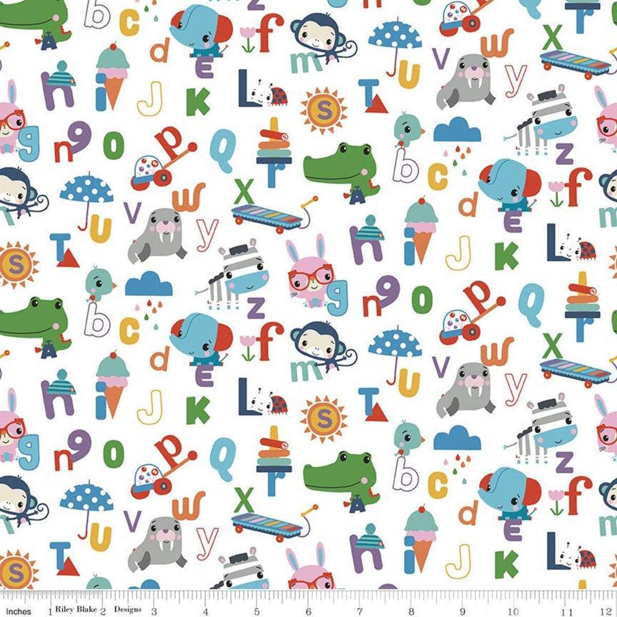 Fisher-Price Let's Play Alphabet in White - 1/2 Yard Increments, Cut Continuously - by Riley Blake Designs